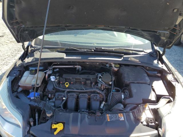 Photo 11 from auction – 2014 FORD FOCUS SE with VIN 1FADP3F23EL433413