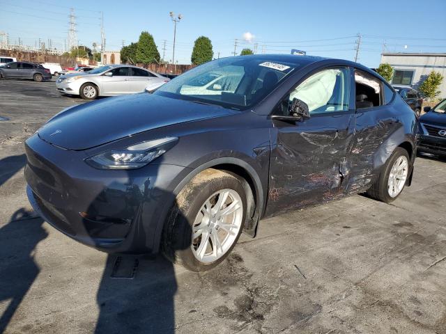 TESLA MODEL Y 2021 with VIN 5YJYGDEE3MF142148 - Photo from auction