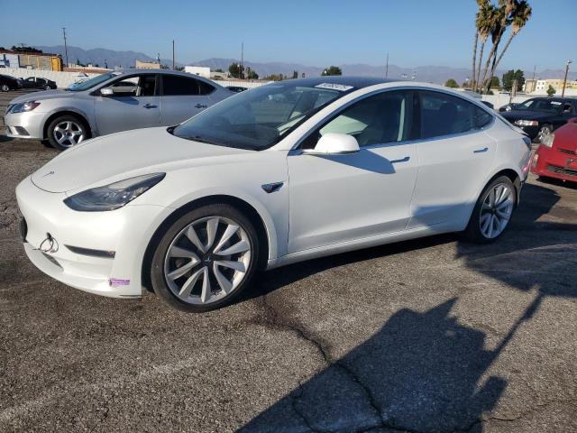 TESLA MODEL 3 2018 with VIN 5YJ3E1EB9JF134040 - Photo from auction
