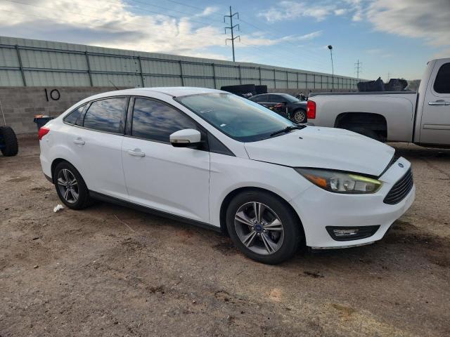 Photo 4 from auction – 2017 FORD FOCUS SE with VIN 1FADP3FE3HL329213