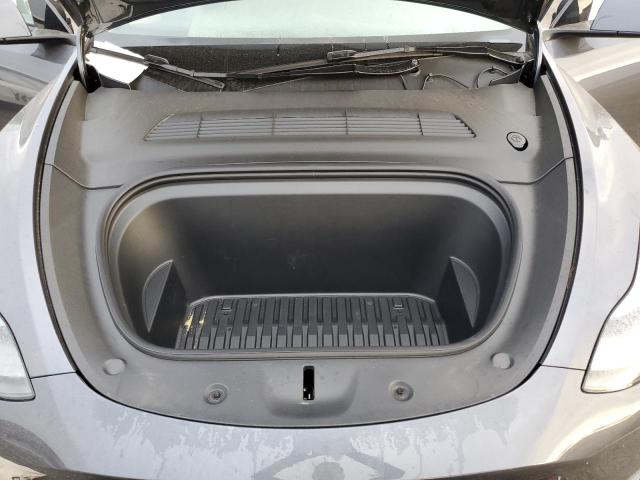 Photo 11 from auction – 2023 TESLA MODEL Y with VIN 7SAYGDED4PF944691