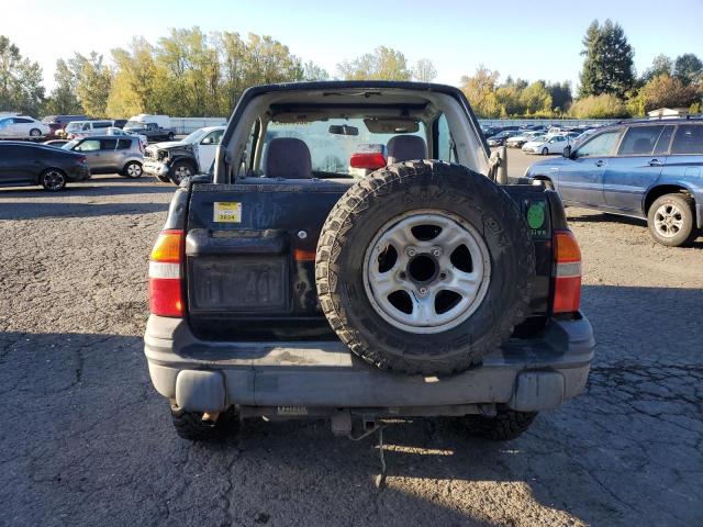 Photo 6 from auction – 2000 CHEVROLET TRACKER with VIN 2CNBJ18C4Y6904684