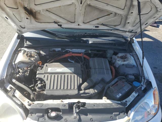 Photo 11 from auction – 2003 HONDA CIVIC HYBR with VIN JHMES95693S008669