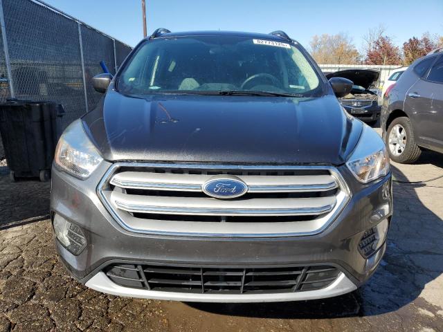 Photo 5 from auction – 2018 FORD ESCAPE SE with VIN 1FMCU0GD2JUC57306