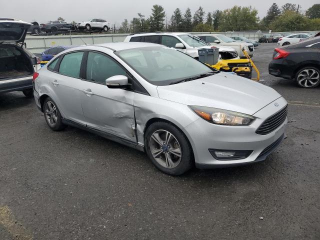 Photo 4 from auction – 2017 FORD FOCUS SE with VIN 1FADP3FE3HL309608
