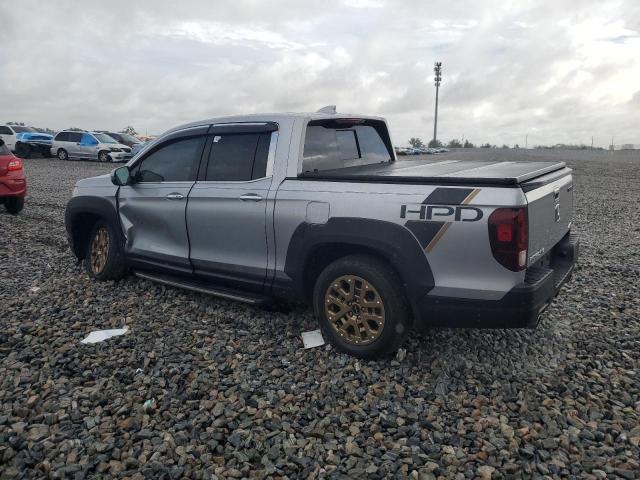 Photo 2 from auction – 2022 HONDA RIDGELINE with VIN 5FPYK3F71NB021278