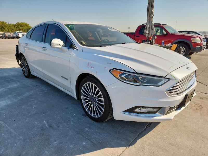 Photo 4 from auction – 2017 FORD FUSION TITANIUM HEV with VIN 3FA6P0RU5HR286358