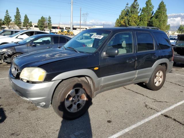 MAZDA TRIBUTE LX 2002 with VIN 4F2YU09192KM66147 - Photo from auction