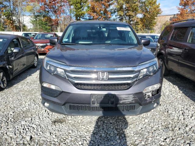 Photo 5 from auction – 2018 HONDA PILOT EXL with VIN 5FNYF6H5XJB014379