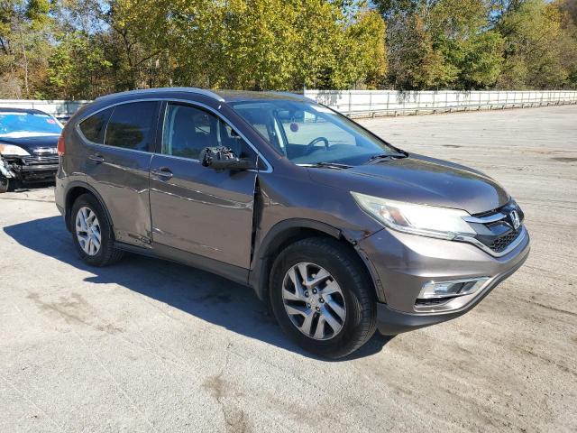 Photo 4 from auction – 2015 HONDA CR-V EXL with VIN 2HKRM4H73FH640557