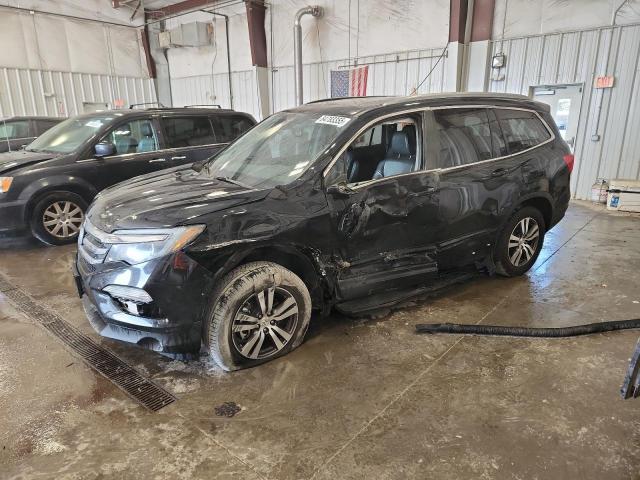 HONDA PILOT EXL 2016 with VIN 5FNYF6H67GB101481 - Photo from auction
