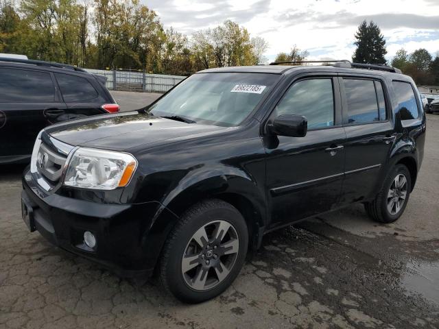 HONDA PILOT EXL 2011 with VIN 5FNYF4H51BB064562 - Photo from auction