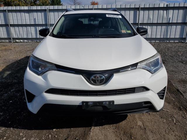 Photo 5 from auction – 2017 TOYOTA RAV4 LE with VIN JTMBFREV7HJ121680