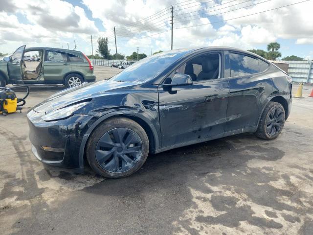 TESLA MODEL Y 2024 with VIN 7SAYGDED3RF208845 - Photo from auction