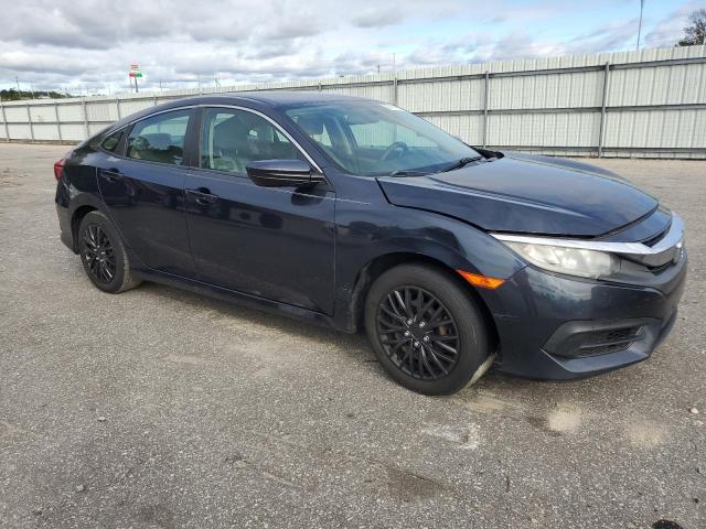 Photo 4 from auction – 2017 HONDA CIVIC LX with VIN 2HGFC2F56HH552014