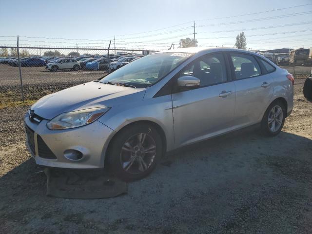 FORD FOCUS SE 2014 with VIN 1FADP3F22EL407157 - Photo from auction