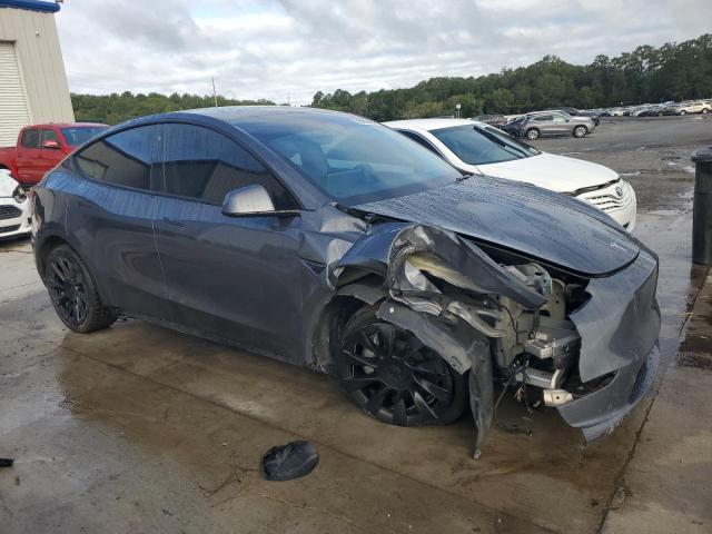Photo 4 from auction – 2023 TESLA MODEL Y with VIN 7SAYGDEE3PA057167