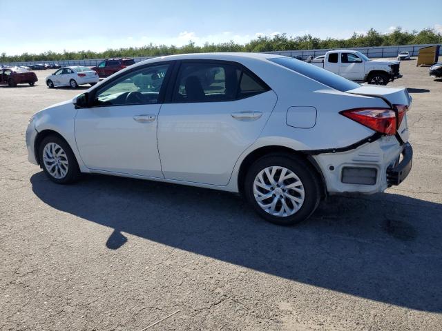 Photo 2 from auction – 2018 TOYOTA COROLLA L with VIN 5YFBURHE0JP755125