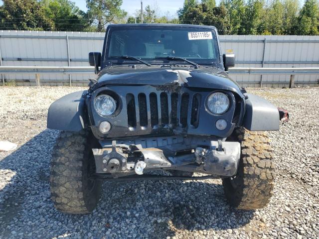 Photo 5 from auction – 2015 JEEP WRANGLER U with VIN 1C4BJWDG8FL722016