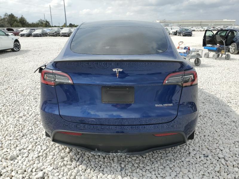 Photo 6 from auction – 2023 TESLA MODEL Y with VIN 7SAYGDEF7PF811344