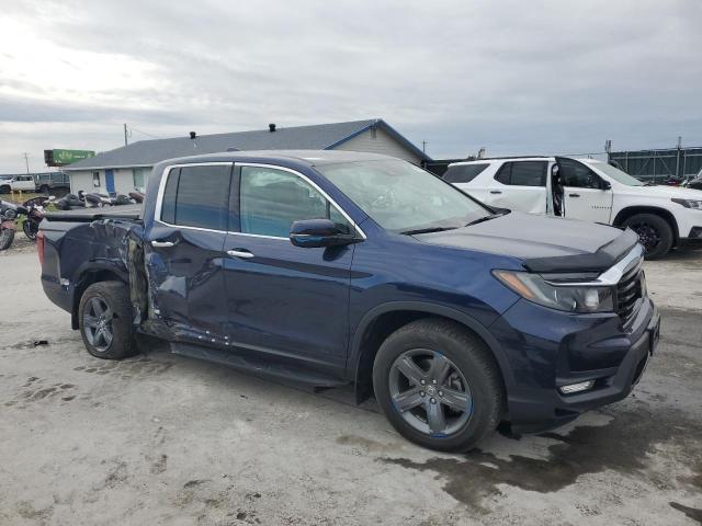 Photo 4 from auction – 2023 HONDA RIDGELINE with VIN 5FPYK3F75PB008388