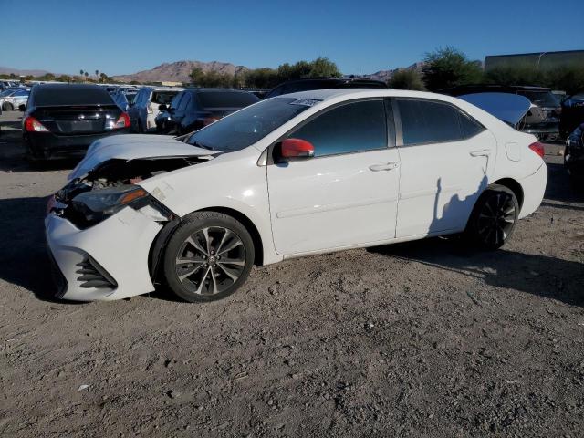 TOYOTA COROLLA L 2019 with VIN 2T1BURHE2KC176364 - Photo from auction