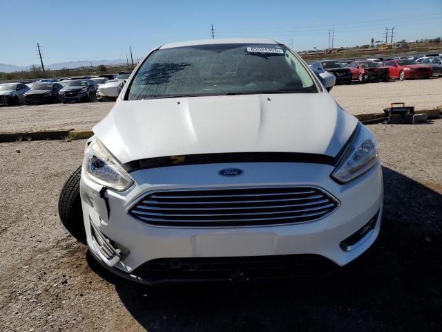 Photo 5 from auction – 2016 FORD FOCUS TITANIUM with VIN 1FADP3J21GL230515