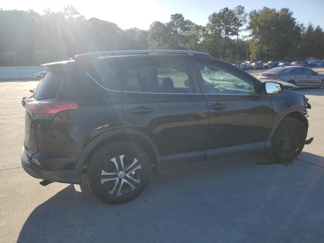 Photo 3 from auction – 2018 TOYOTA RAV4 LE with VIN 2T3ZFREV6JW503687
