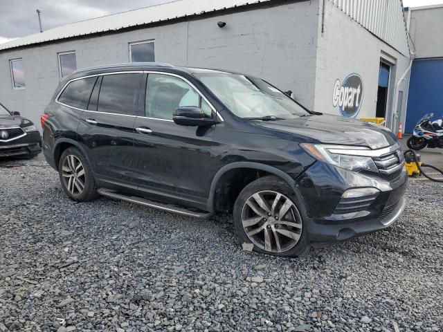 Photo 4 from auction – 2016 HONDA PILOT ELIT with VIN 5FNYF6H02GB064819