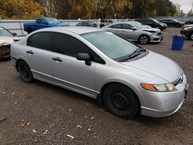 Photo 4 from auction – 2009 HONDA CIVIC DX with VIN 2HGFA16249H008103