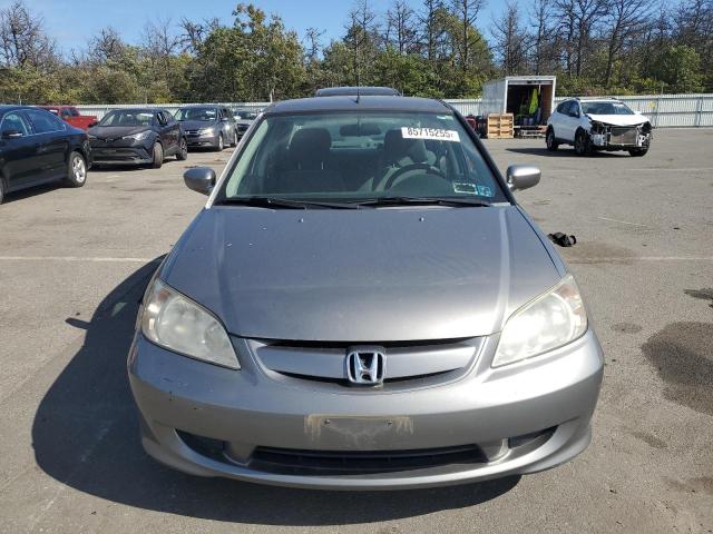Photo 5 from auction – 2004 HONDA CIVIC HYBR with VIN JHMES96644S016923