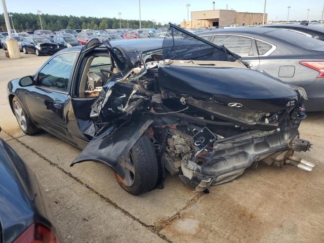 Photo 2 from auction – 2002 INFINITI I35 with VIN JNKDA31A02T001446