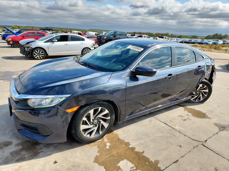 HONDA CIVIC EX 2018 with VIN 2HGFC2F72JH606464 - Photo from auction