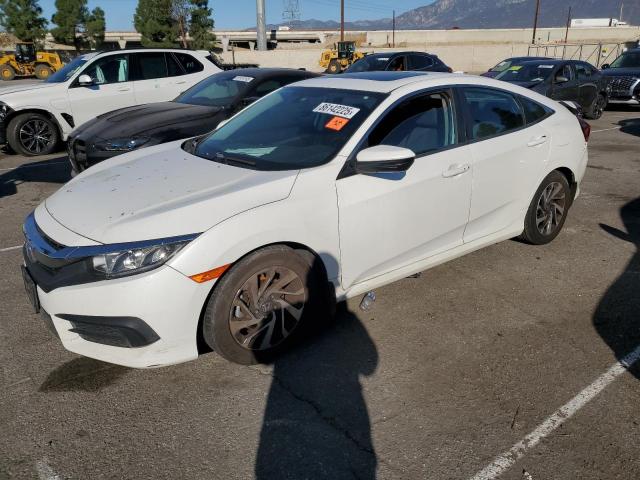 HONDA CIVIC EX 2017 with VIN 2HGFC2F70HH563172 - Photo from auction