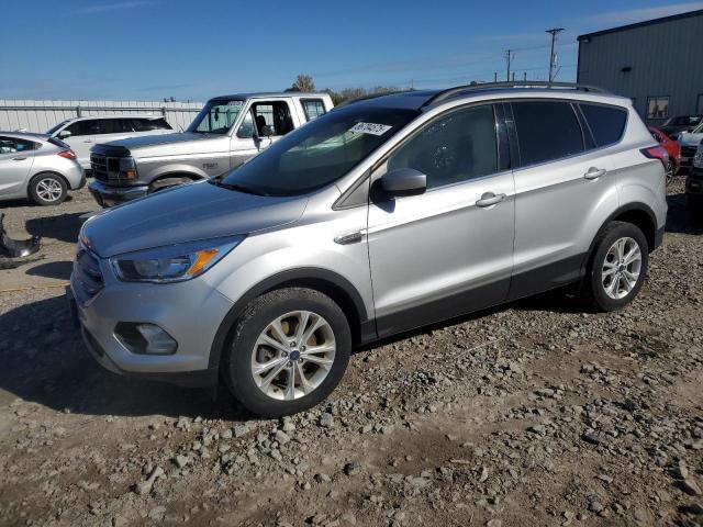FORD ESCAPE SE 2018 with VIN 1FMCU9GD8JUA73931 - Photo from auction