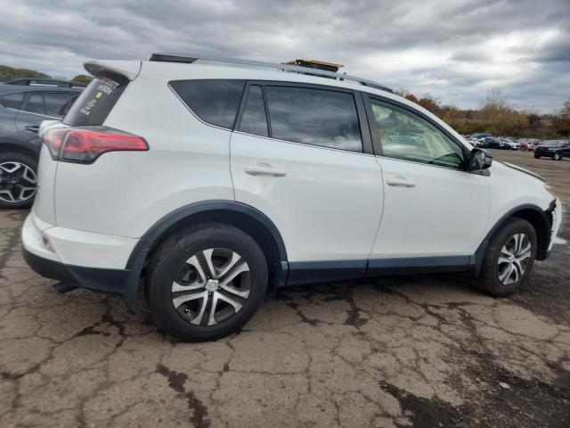 Photo 3 from auction – 2018 TOYOTA RAV4 LE with VIN JTMBFREV2JJ260007