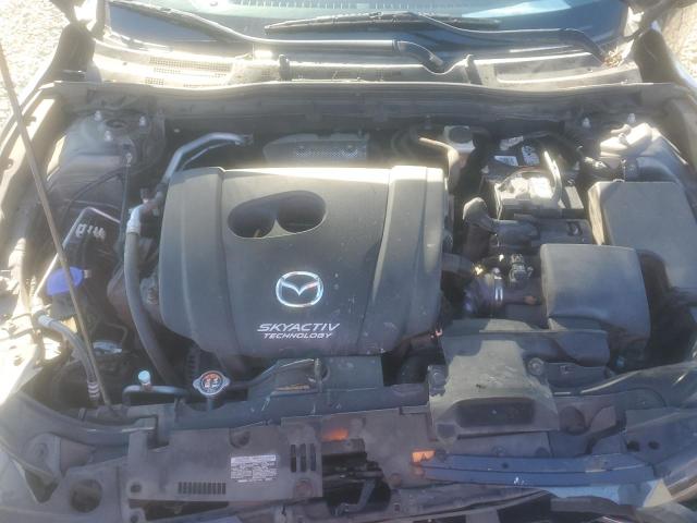 Photo 11 from auction – 2015 MAZDA 3 TOURING with VIN 3MZBM1V71FM127299
