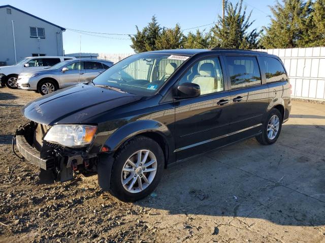 DODGE GRAND CARA 2014 with VIN 2C4RDGCG4ER337085 - Photo from auction