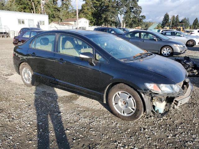 Photo 4 from auction – 2010 HONDA CIVIC HYBR with VIN JHMFA3F27AS005380