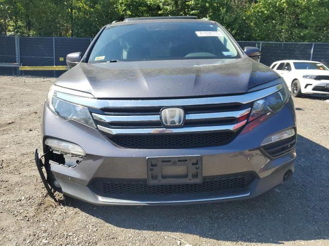 Photo 5 from auction – 2018 HONDA PILOT ELITE with VIN 5FNYF6H04JB039248