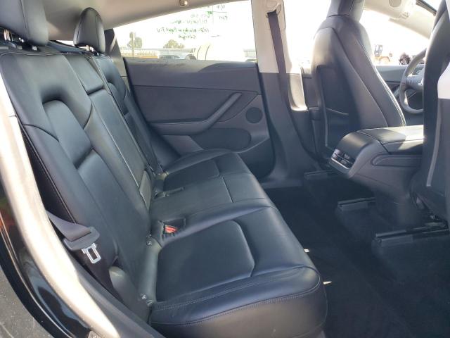 Photo 11 from auction – 2022 TESLA MODEL Y with VIN 7SAYGDEE3NF494716
