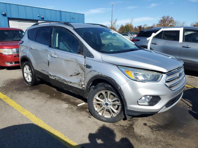 Photo 4 from auction – 2018 FORD ESCAPE SE with VIN 1FMCU0GD9JUC69212