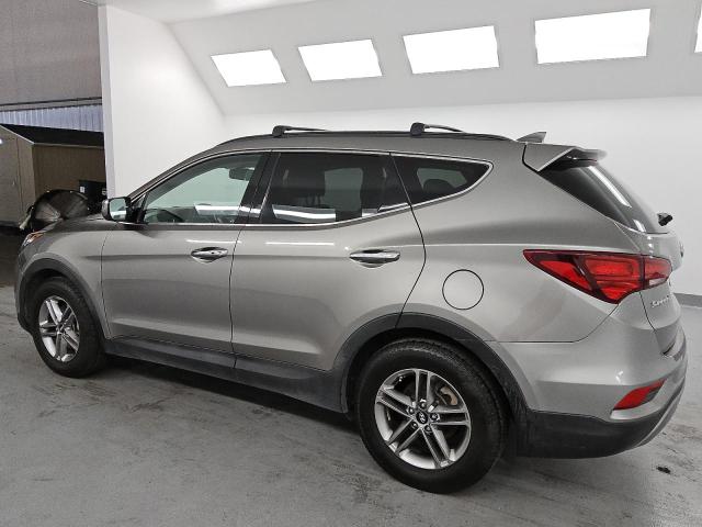 Photo 2 from auction – 2017 HYUNDAI SANTA FE S with VIN 5NMZU3LB2HH016304