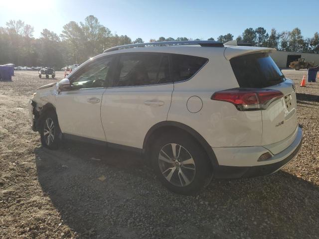 Photo 2 from auction – 2017 TOYOTA RAV4 XLE with VIN JTMWFREV0HJ105922