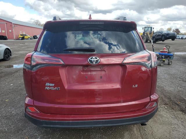 Photo 6 from auction – 2018 TOYOTA RAV4 LE with VIN 2T3ZFREV0JW498356
