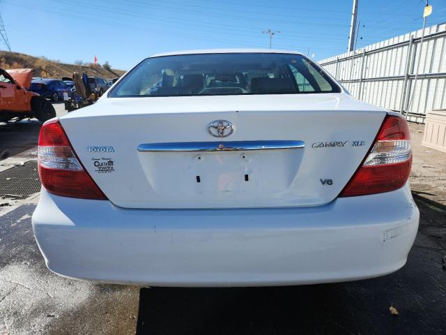 Photo 6 from auction – 2002 TOYOTA CAMRY LE with VIN 4T1BF30KX2U500118