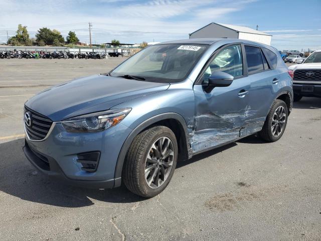 MAZDA CX-5 GT 2016 with VIN JM3KE4DY9G0612426 - Photo from auction