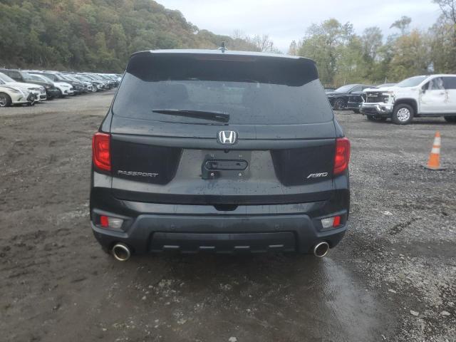 Photo 6 from auction – 2022 HONDA PASSPORT E with VIN 5FNYF8H55NB030474
