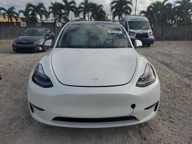 Photo 5 from auction – 2022 TESLA MODEL Y with VIN 7SAYGDEF0NF455820
