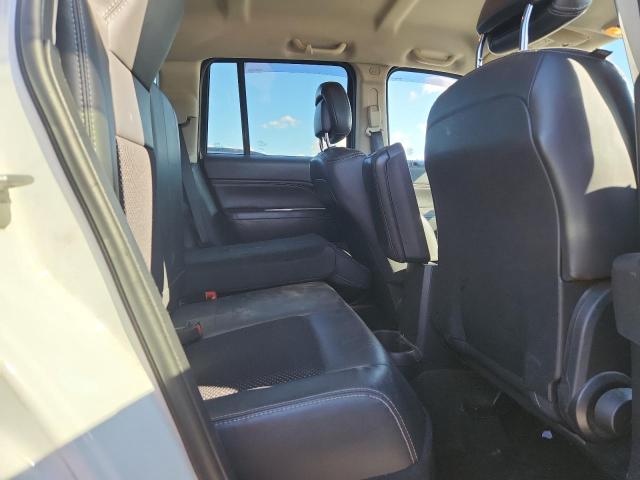 Photo 10 from auction – 2014 JEEP COMPASS LA with VIN 1C4NJDEB0ED855804